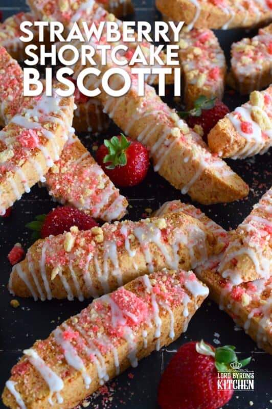 These biscotti are loaded with homemade strawberry shortcake crumbs and topped with a simple sugary glaze. Strawberry Shortcake Biscotti are light, airy, and delicious! Super easy to make, and with their cheerful inclination, no one could resist! Treat yourself to one of these with a hot tea on a lazy Sunday afternoon. #strawberry #shortcake #crumbs #cookies #biscotti #valentine