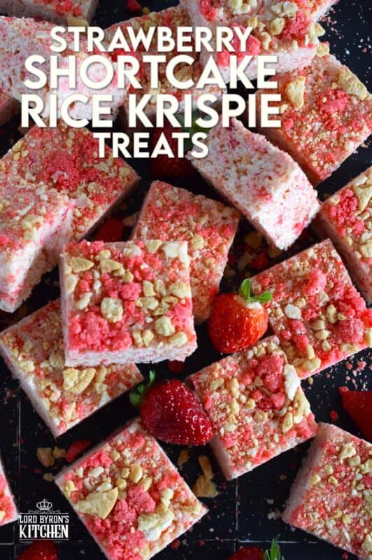 Strawberry Shortcake Rice Krispie Treats are loaded with those nostalgic pink and white cookie crumbs we all love! This no-bake confection is a favourite among kids both young and old, and they are easy to prepare and fun to eat too. These treats can also be prepared with vegan marshmallows if you have any dietary restrictions. #strawberry #shortcake #crumbs #ricekrispie #treats #squares #valentine #pink