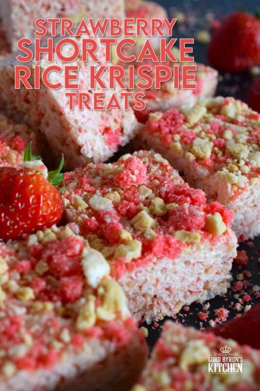 Strawberry Shortcake Rice Krispie Treats are loaded with those nostalgic pink and white cookie crumbs we all love! This no-bake confection is a favourite among kids both young and old, and they are easy to prepare and fun to eat too. These treats can also be prepared with vegan marshmallows if you have any dietary restrictions. #strawberry #shortcake #crumbs #ricekrispie #treats #squares #valentine #pink