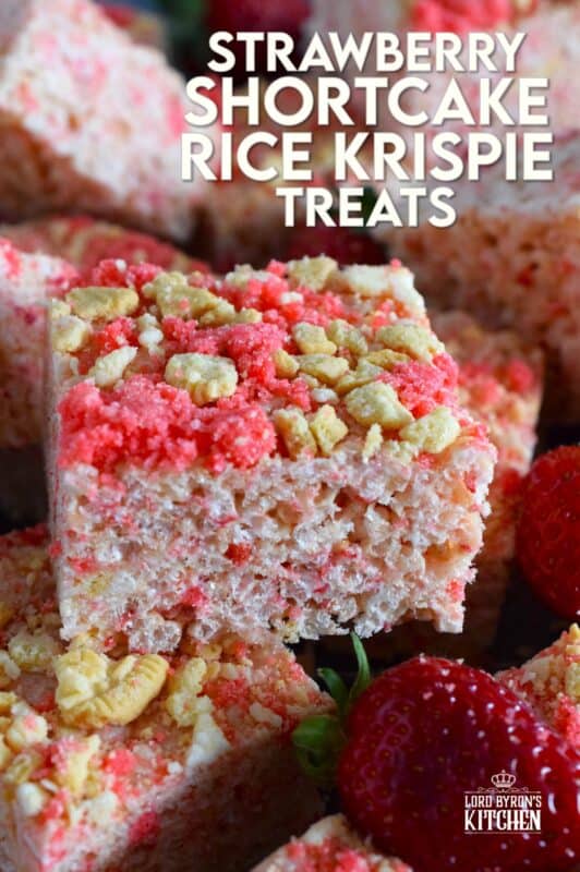 Strawberry Shortcake Rice Krispie Treats are loaded with those nostalgic pink and white cookie crumbs we all love! This no-bake confection is a favourite among kids both young and old, and they are easy to prepare and fun to eat too. These treats can also be prepared with vegan marshmallows if you have any dietary restrictions. #strawberry #shortcake #crumbs #ricekrispie #treats #squares #valentine #pink