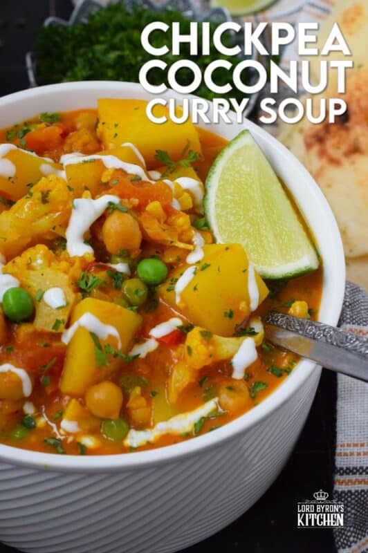 Chickpea Coconut Curry Soup is everything but bland; prepared with lots of vegetables, warming spices, and a fresh burst of lime juice, this soup is also vegetarian and vegan-friendly too! Serve with naan bread for a well-balanced, hearty meal! #curry #coconut #soup #stew #vegan