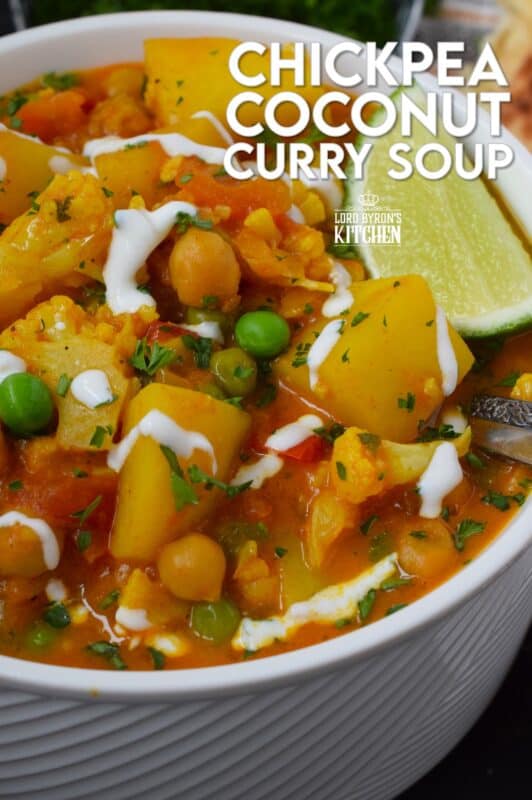 Chickpea Coconut Curry Soup is everything but bland; prepared with lots of vegetables, warming spices, and a fresh burst of lime juice, this soup is also vegetarian and vegan-friendly too! Serve with naan bread for a well-balanced, hearty meal! #curry #coconut #soup #stew #vegan
