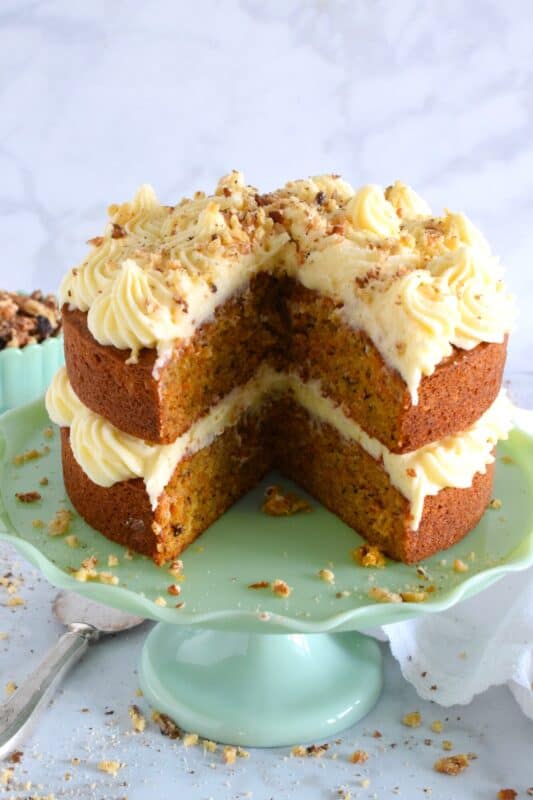 My favourite cake is a carrot cake with cream cheese frosting - more specifically, it's this particular carrot cake recipe. Known to my daughter as Poppy Merrick, this is the recipe he used as a cook for over 30 years on the Canadian Coast Guard. This cake is super moist and flavourful! #carrotcake #cake #carrot #frosting #creamcheese