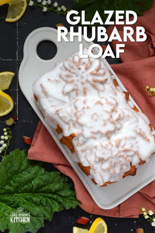 Prepared with lots of fresh rhubarb, this moist and delicious, lemony and refreshing loaf is drizzled with a sweet sugary glaze. Glazed Rhubarb Loaf is a perfect dessert or a lovely addition to your afternoon tea. This is a late-spring brunch item that doubles as an evening after-dinner dessert. #loaf #bread #cake #rhubarb #fresh