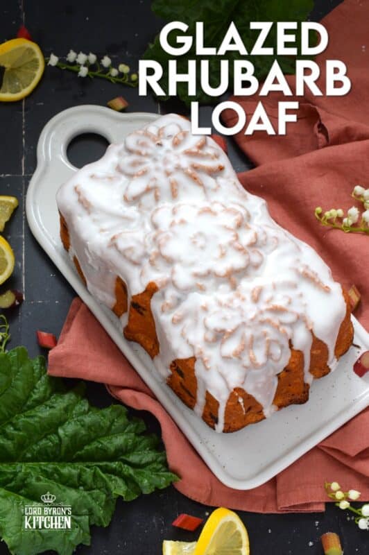 Prepared with lots of fresh rhubarb, this moist and delicious, lemony and refreshing loaf is drizzled with a sweet sugary glaze. Glazed Rhubarb Loaf is a perfect dessert or a lovely addition to your afternoon tea. This is a late-spring brunch item that doubles as an evening after-dinner dessert. #loaf #bread #cake #rhubarb #fresh
