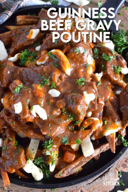 Crispy, homemade fries, top with squeaky cheese curds, and smothered in a delicious beef gravy made with guinness beer, this Irish-inspired poutine adds a St. Patrick's Day twist to a popular Canadian dish that everyone loves to dig into! #stpatricksday #irish #poutine #beef #beer #guinness #stout #gravy