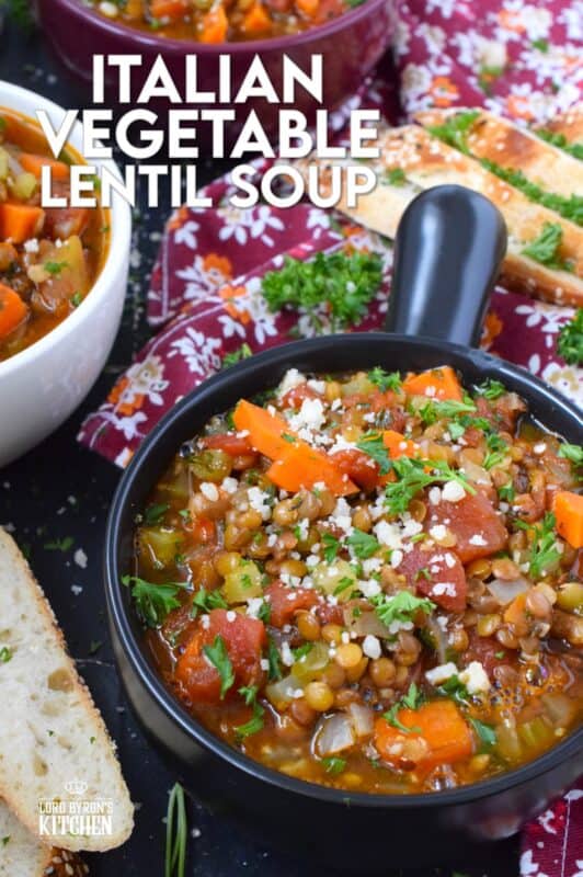 Italian Vegetable Lentil Soup is in fact more like a stew than a soup! It has a homestyle tomato flavour combined with the heartiness of tender, cooked lentils, and is paired with lots of fresh and good-for-you vegetables too. Top with grated parmesan and serve with crusty bread! #lentils #vegetable #soup #italian #parmesan