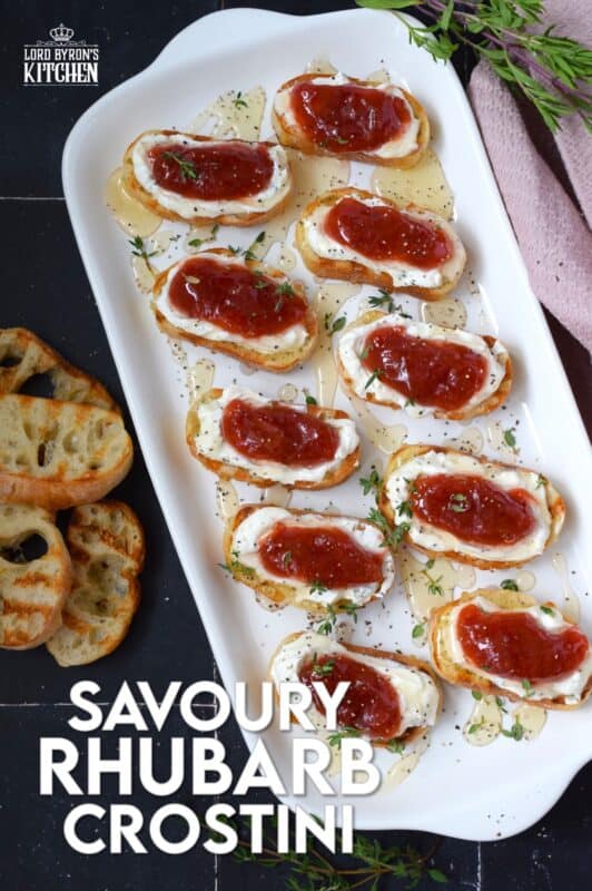 Spread with sweetened whipped cream cheese and topped with a homemade compote, this Savoury Rhubarb Crostini makes a lovely breakfast or brunch as well as a deliciously mouth-watering appetizer. Drizzle with honey and a sprinkling of fresh herbs for best results! #rhubarb #crostini #compote #appetizer