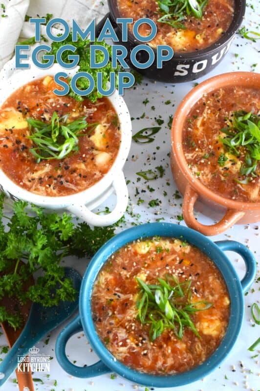 This quick and easy savoury Tomato Egg Drop Soup is prepared from start to finish in about 20 minutes! Better than the soup they serve at your favourite Chinese restaurant, and with an optional splash of hot sauce, the cozy and warm soup is hearty and healthy too! #asian #soup #eggdrop #vegetarian #eggs