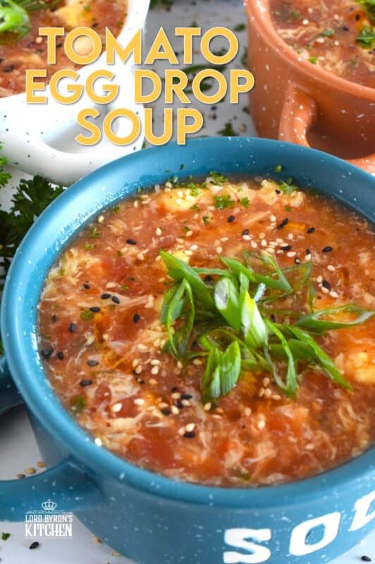 This quick and easy savoury Tomato Egg Drop Soup is prepared from start to finish in about 20 minutes! Better than the soup they serve at your favourite Chinese restaurant, and with an optional splash of hot sauce, the cozy and warm soup is hearty and healthy too! #asian #soup #eggdrop #vegetarian #eggs