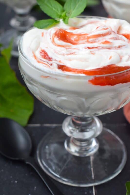 Traditionally, a fool is made with a sweet custard, but in this version, a homemade tart rhubarb compote is folded into a light and fluffy sweetened whipped cream. So simple yet so delicious, a Tart Rhubarb Fool is a must when rhubarb is in season! #fool #dessert #rhubarb
