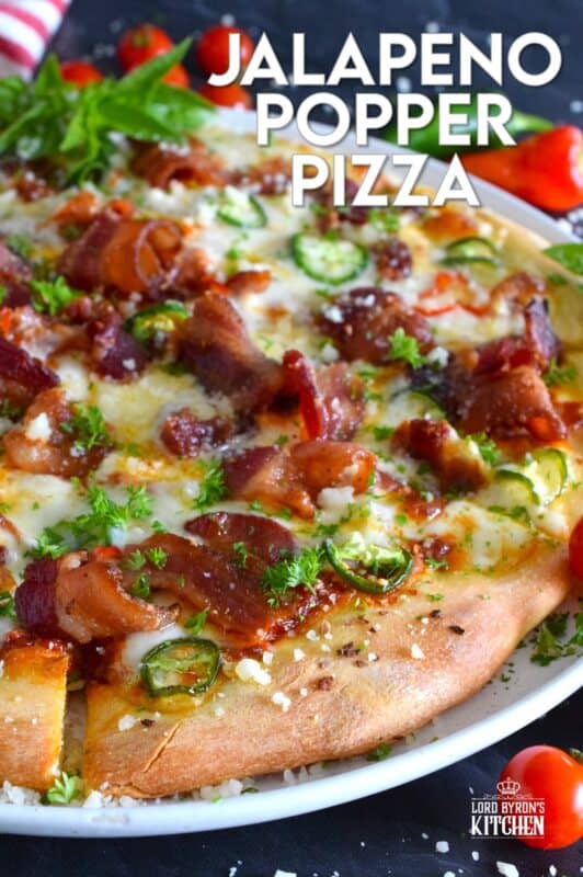 Shelf the tomato-based pizza sauce, because this Jalapeno Popper Pizza is not only prepared with an easy, homemade pizza dough, it's also made with a cream cheese spread. Loaded with lots of bacon, jalapenos, and mozzarella, this pizza is made to impress. Super flavourful with just the right amount of spice and heat, one slice is just a tease! #pizza #jalapeno #jalapenopopper #popper #homemade