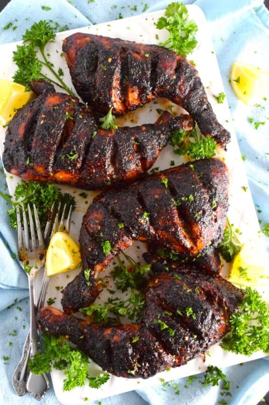 These Baked Chicken Leg Quarters are super easy to prepare! Not only are they savoury with a little spiciness, they're also flavoured with some common Asian ingredients. Deeply scoring the chicken creates opportunity for the seasoning to sink into the chicken, making the often overlooked chicken leg deliciously enjoyable! #chicken #quarters #legs #baked #oven
